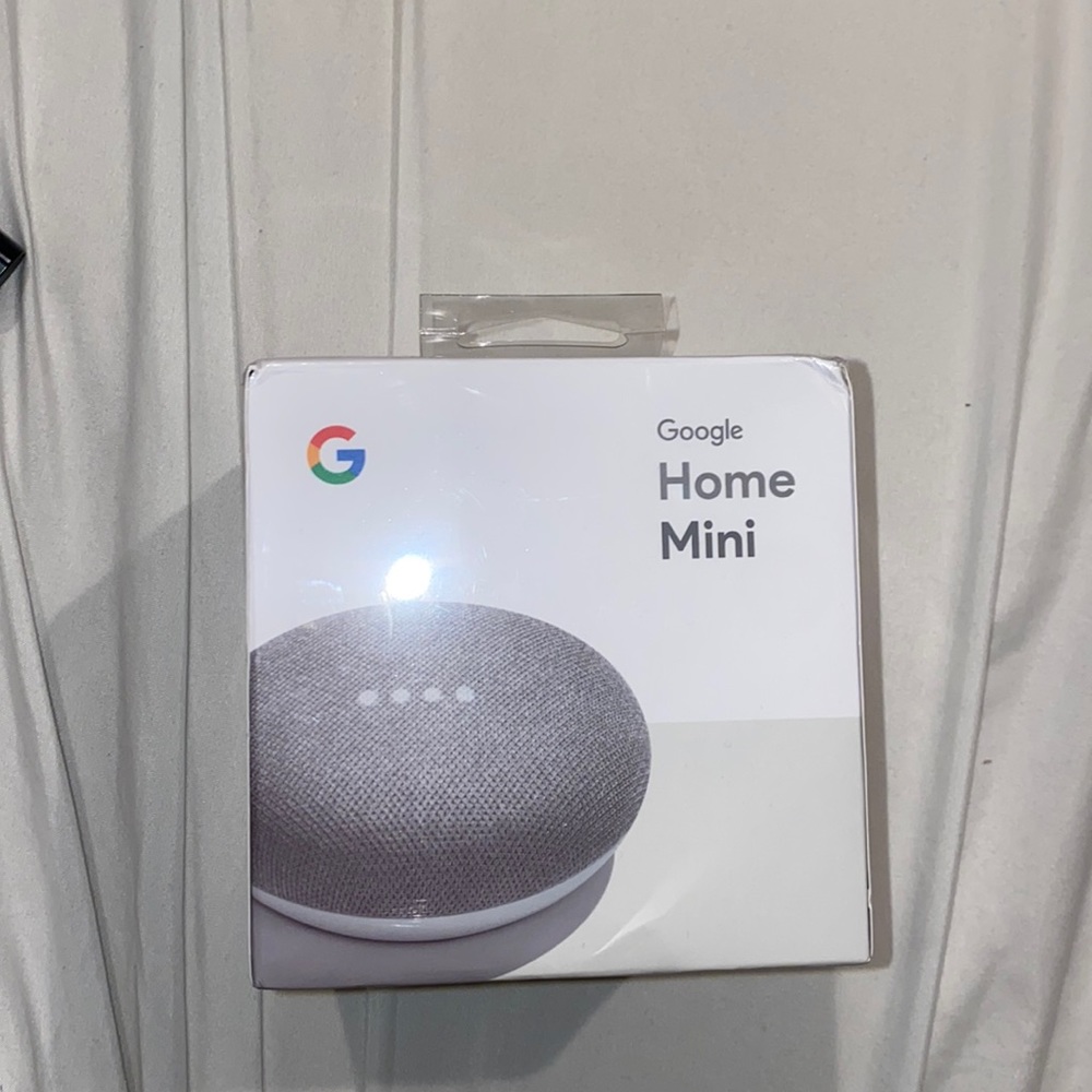 Google home mini for sale never opened or used.